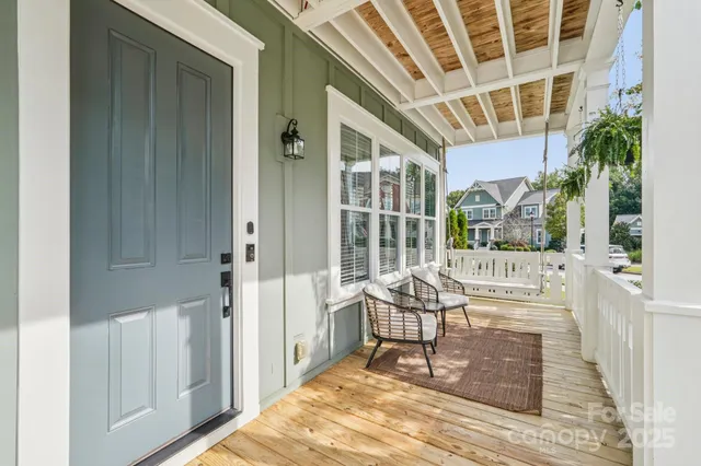an aerial view of a house with a garden