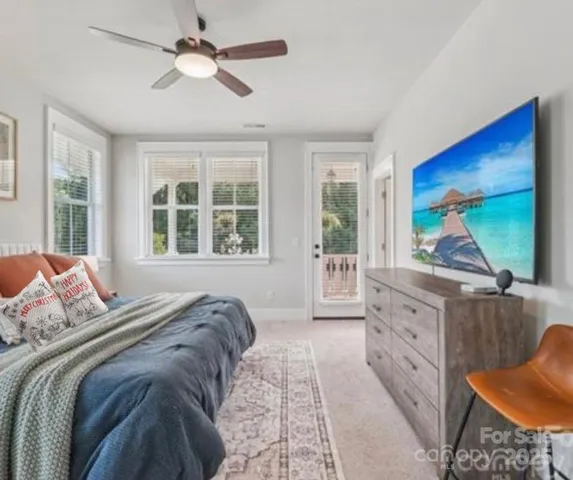 a balcony view with a potted plant and outdoor space