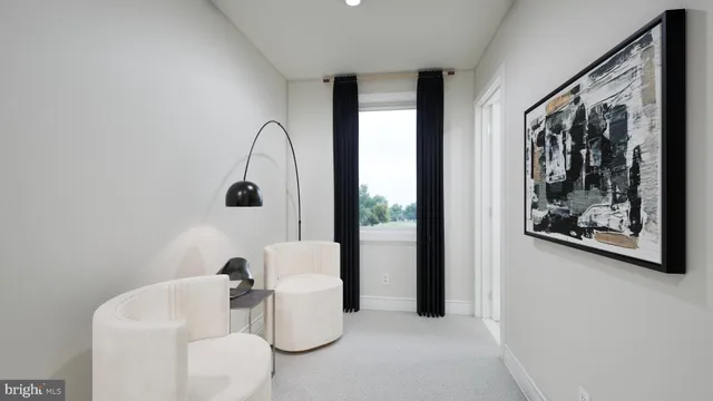 a living room with furniture and window