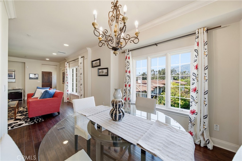 2454 Oswego Street, Unit 301 Pasadena, CA 91107 - Photo 14 of 59 a view of a dining room with furniture window and wooden floor