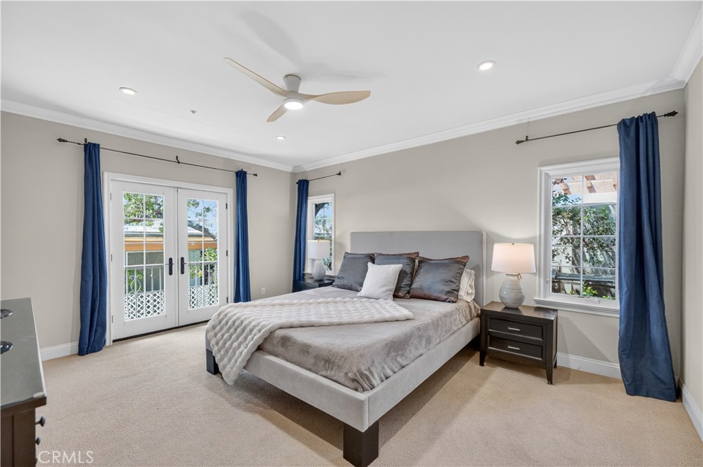 2454 Oswego Street, Unit 301 Pasadena, CA 91107 - Photo 21 of 59 a bedroom with a large bed and a balcony