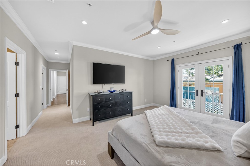 2454 Oswego Street, Unit 301 Pasadena, CA 91107 - Photo 22 of 59 a bedroom with a bed and a flat screen tv
