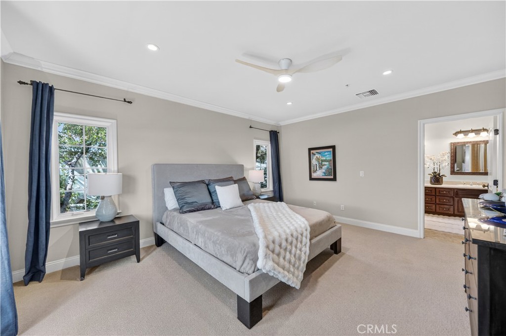 2454 Oswego Street, Unit 301 Pasadena, CA 91107 - Photo 24 of 59 a bedroom with a bed and a couch