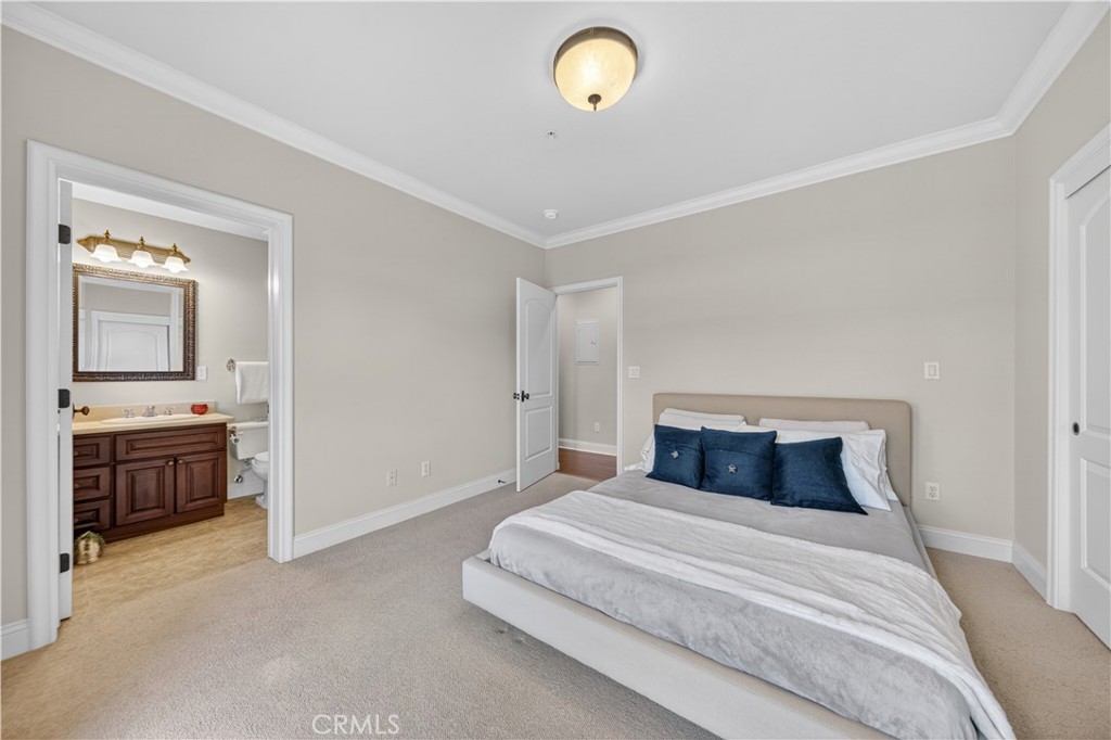 2454 Oswego Street, Unit 301 Pasadena, CA 91107 - Photo 34 of 59 a bedroom with a bed and a sink