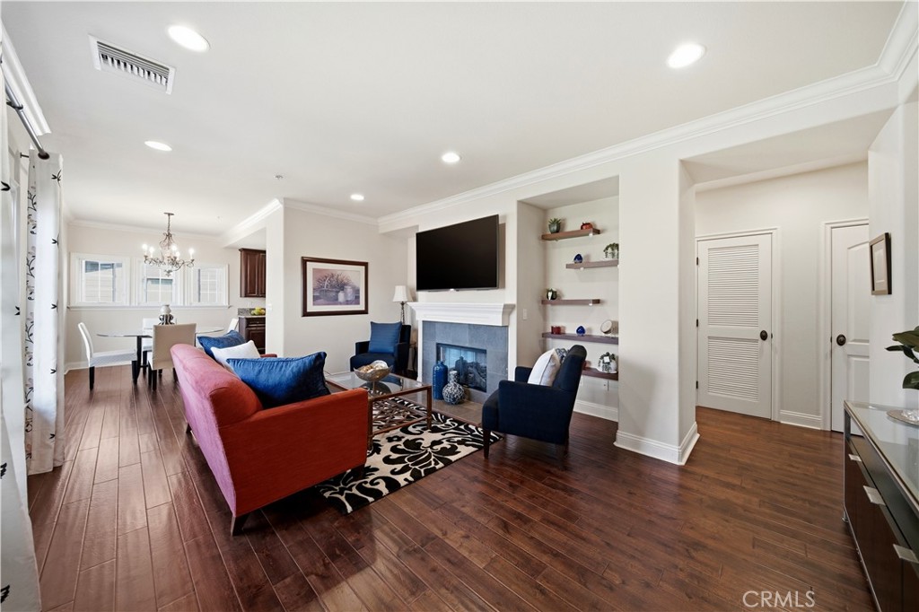2454 Oswego Street, Unit 301 Pasadena, CA 91107 - Photo 4 of 59 a living room with fireplace furniture and a flat screen tv