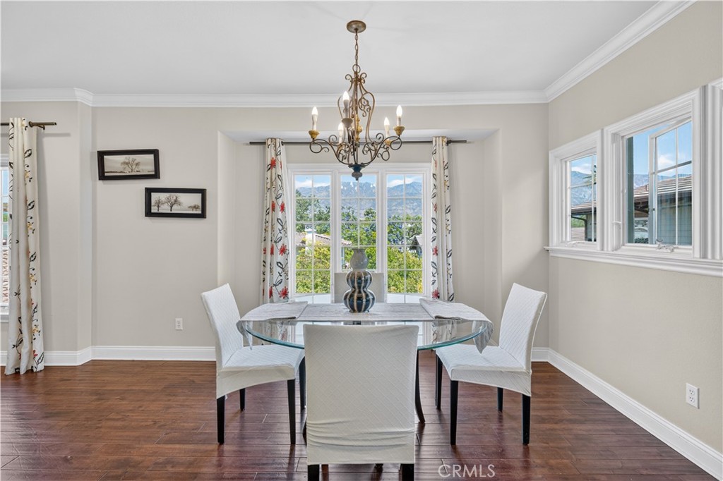 2454 Oswego Street, Unit 301 Pasadena, CA 91107 - Photo 9 of 59 a view of a dining room with furniture window and wooden floor