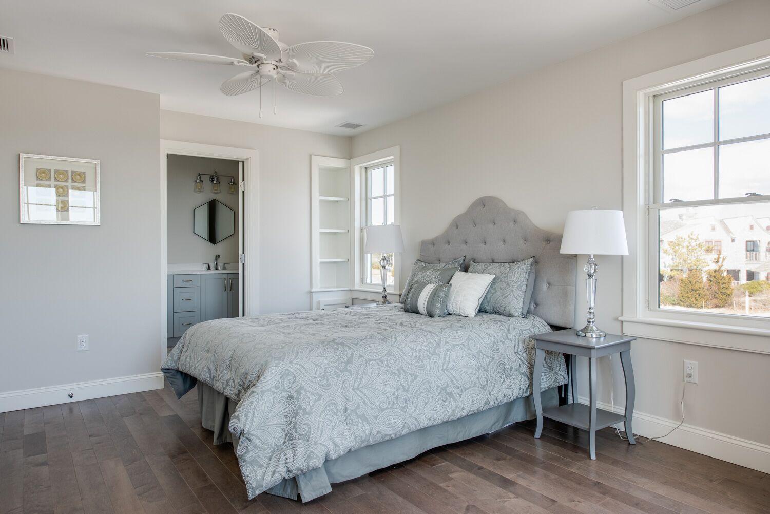 6 Beach Road Mashpee, MA 02649 - Photo 14 of 25 a bedroom with a bed and a window