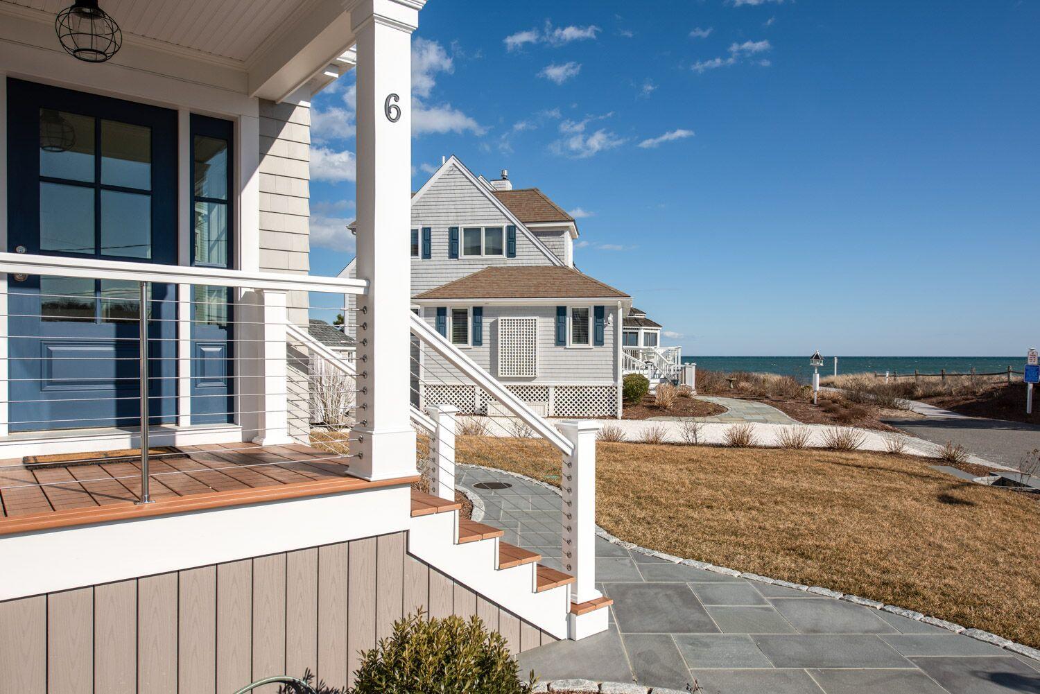6 Beach Road Mashpee, MA 02649 - Photo 16 of 25 a view of a house with backyard and deck