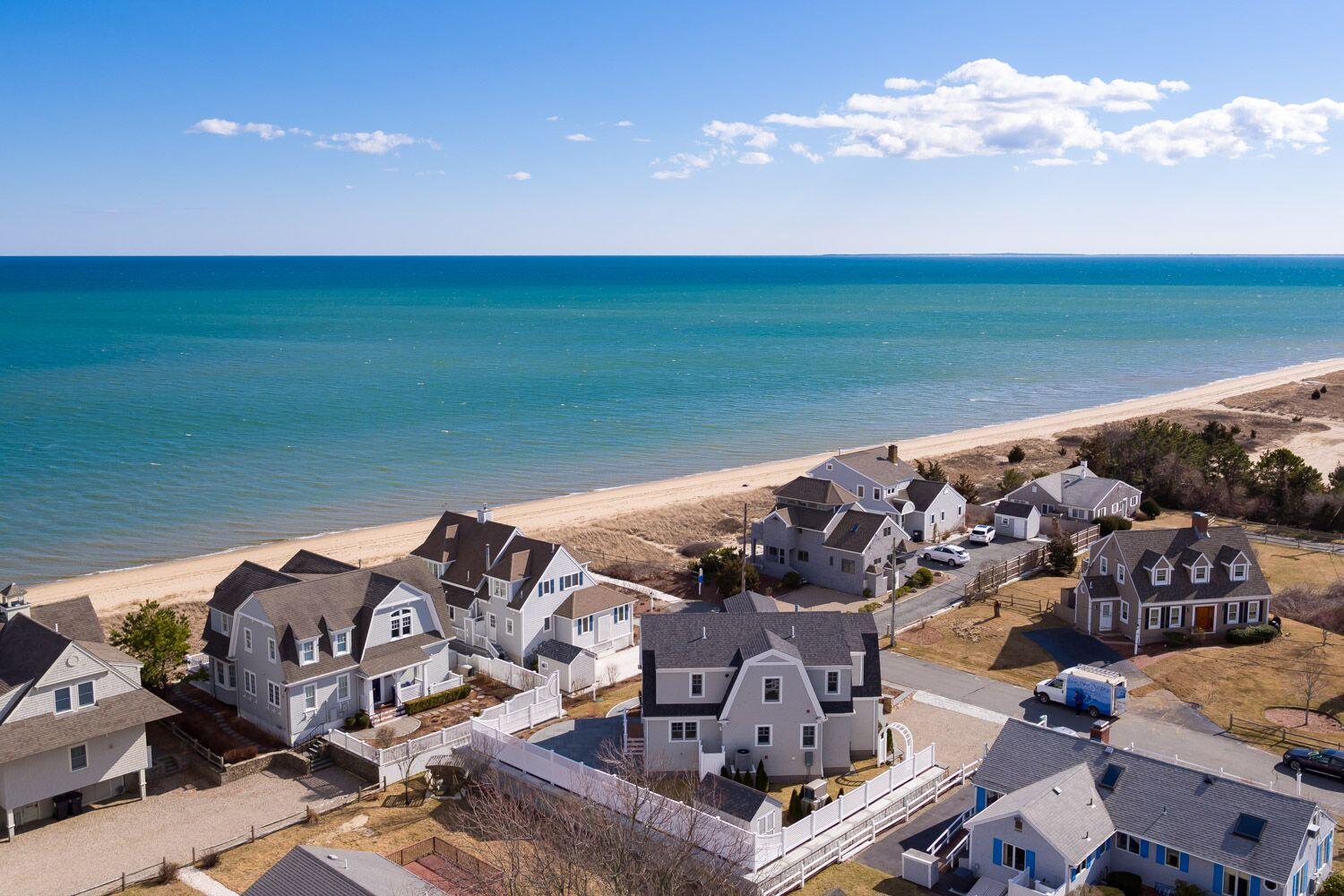 6 Beach Road Mashpee, MA 02649 - Photo 18 of 25 an aerial view of houses with outdoor space