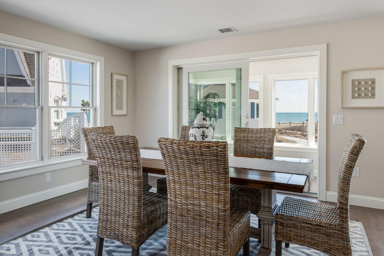 6 Beach Road Mashpee, MA 02649 - Photo 6 of 25 a dining room with furniture and windows