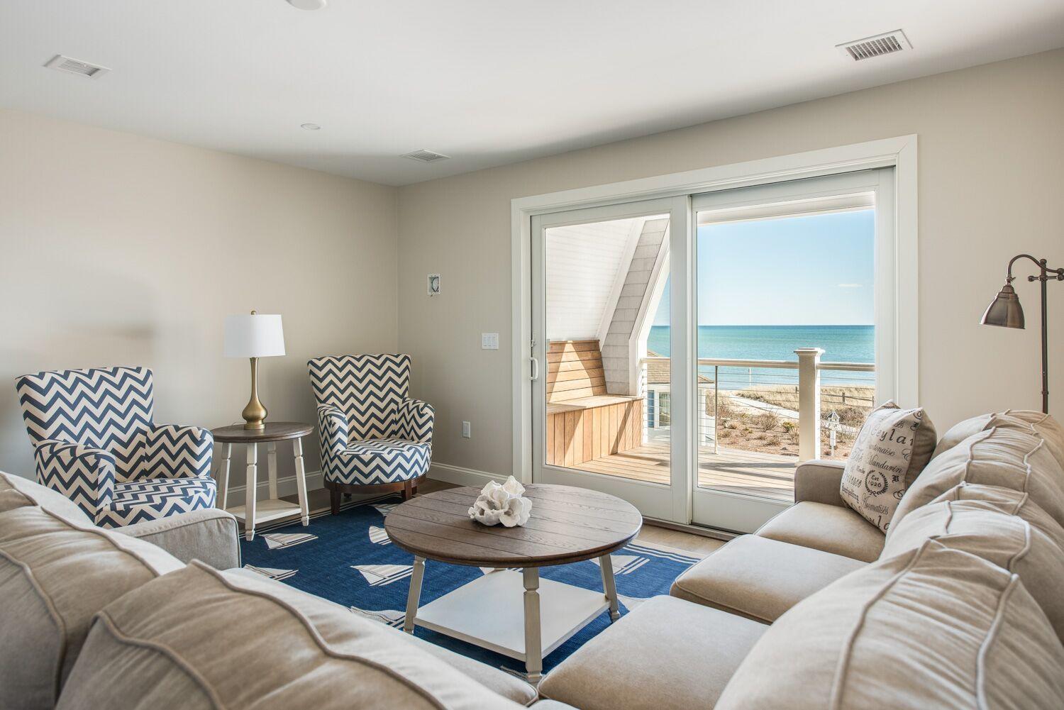 6 Beach Road Mashpee, MA 02649 - Photo 10 of 25 a living room with furniture