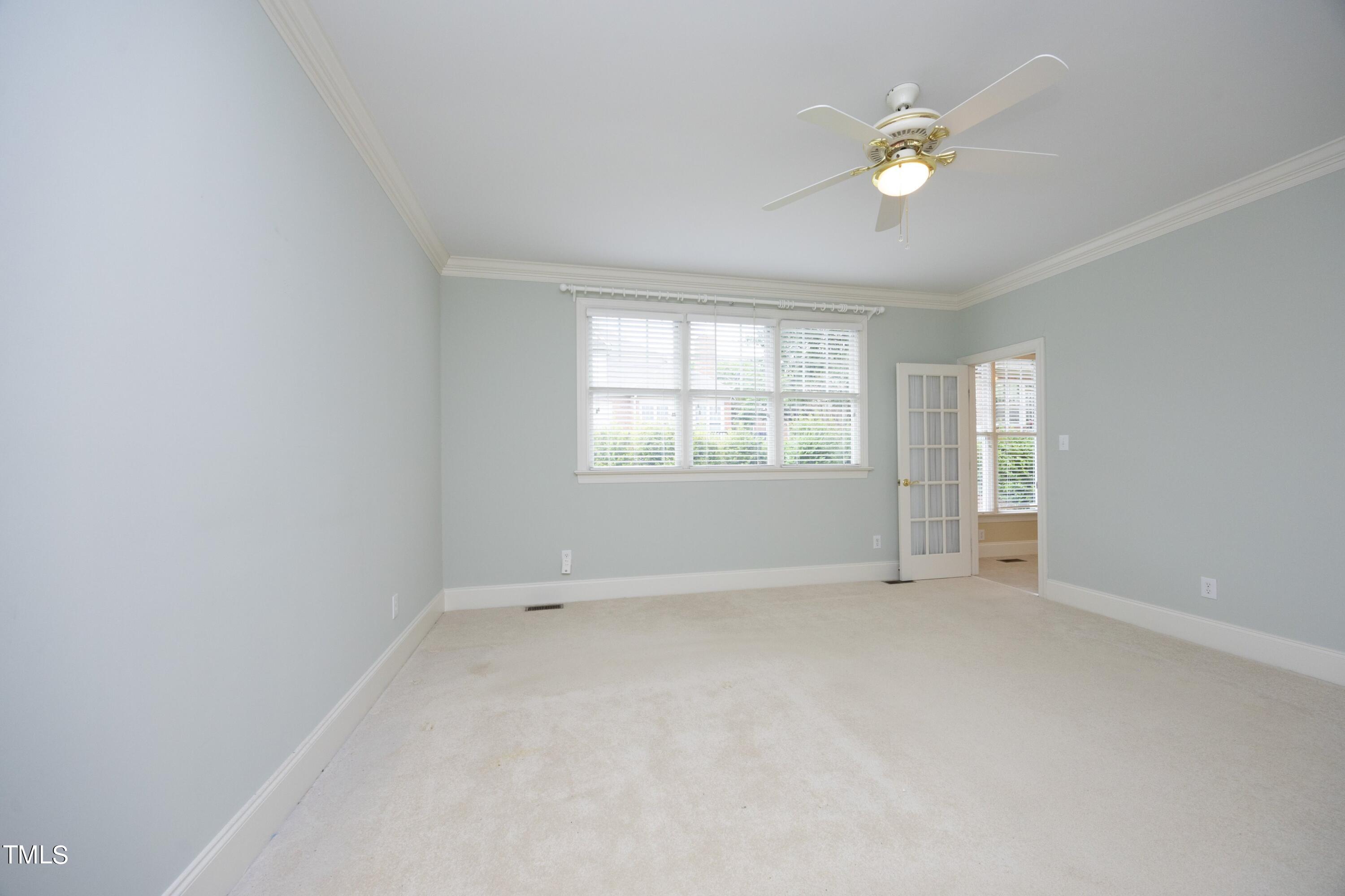 8805 Leeshire Lane Raleigh, NC 27615 - Photo 12 of 26 an empty room with windows