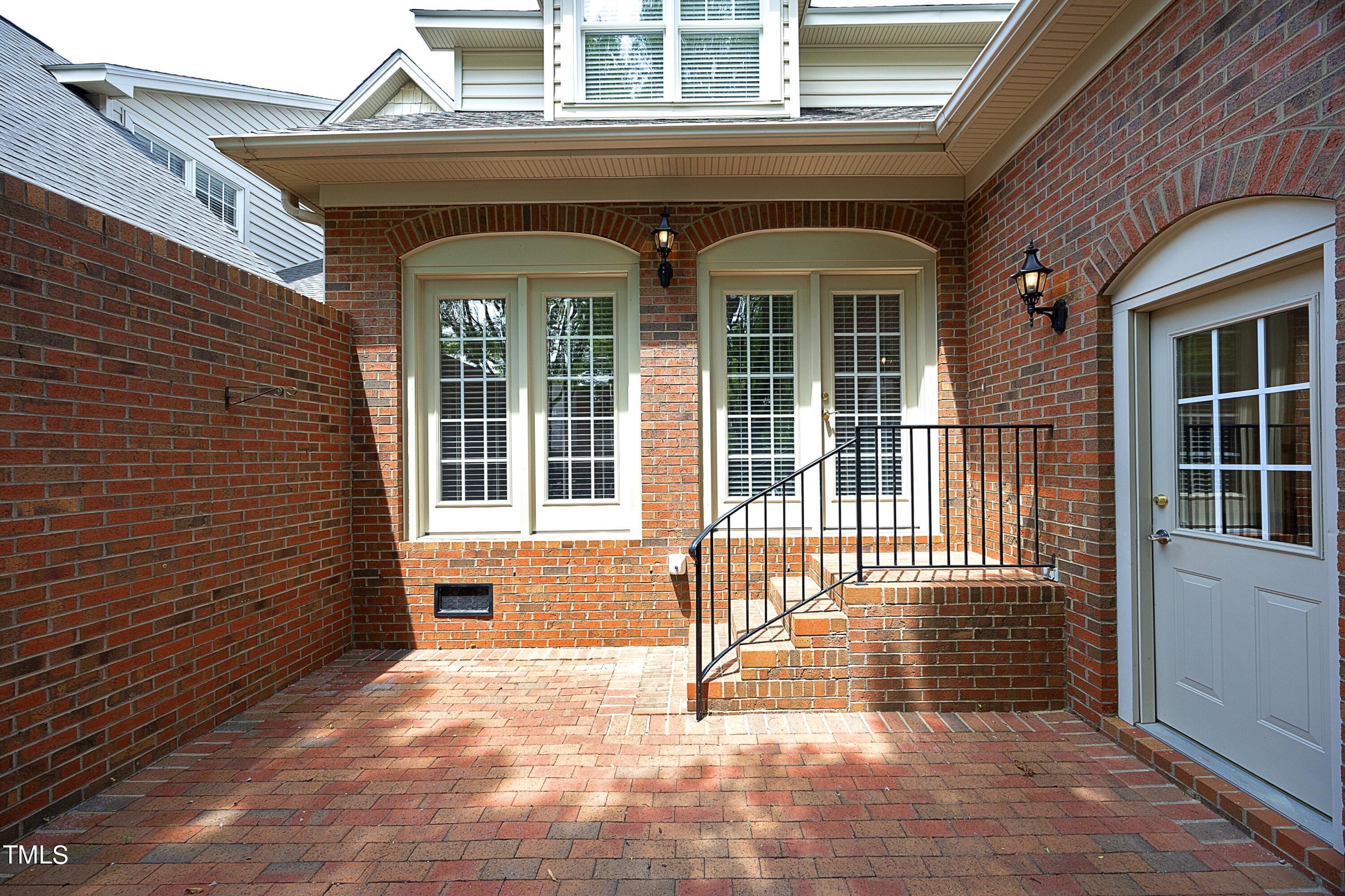 8805 Leeshire Lane Raleigh, NC 27615 - Photo 2 of 26 a view of entrance door of the house