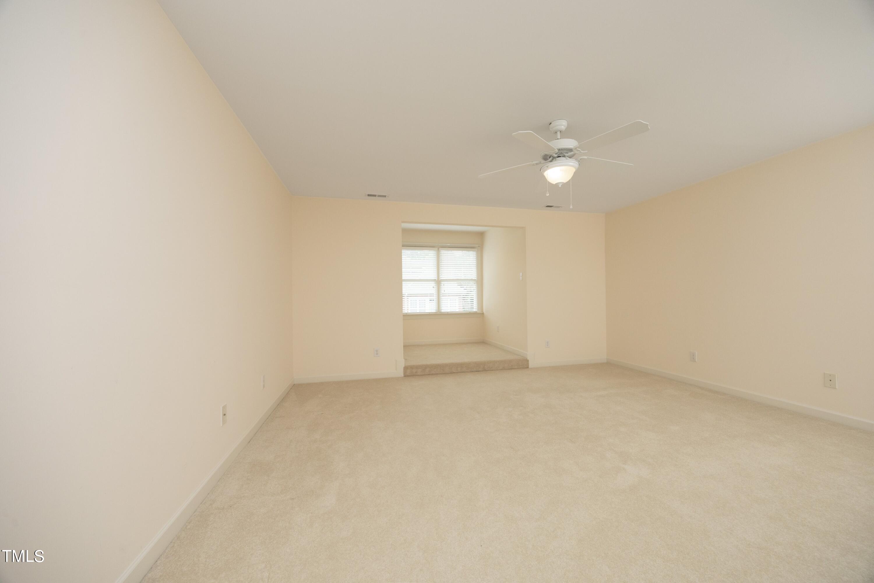 8805 Leeshire Lane Raleigh, NC 27615 - Photo 24 of 26 an empty room with windows and closet