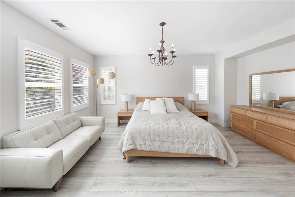 6 Teardrop Irvine, CA 92603 - Photo 25 of 42 a spacious bedroom with a bed and window