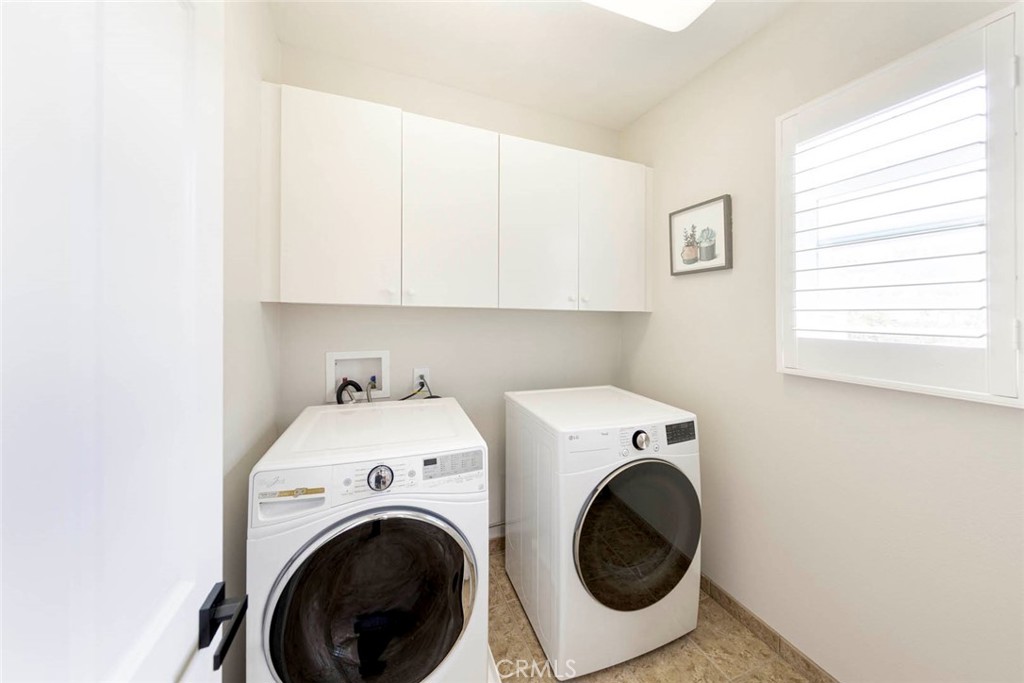 6 Teardrop Irvine, CA 92603 - Photo 32 of 42 a utility room with dryer and washer