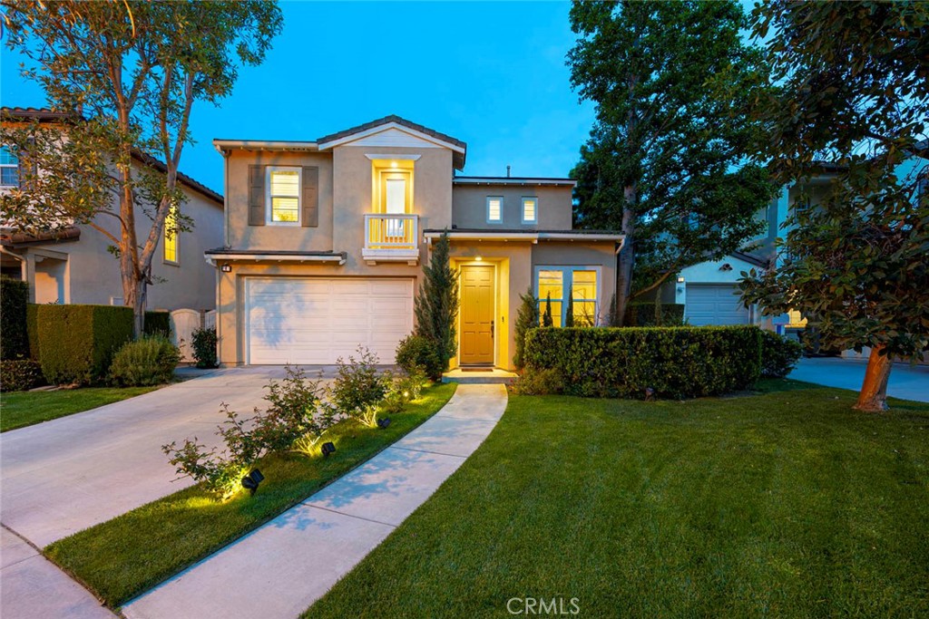 6 Teardrop Irvine, CA 92603 - Photo 38 of 42 a front view of a house with a garden