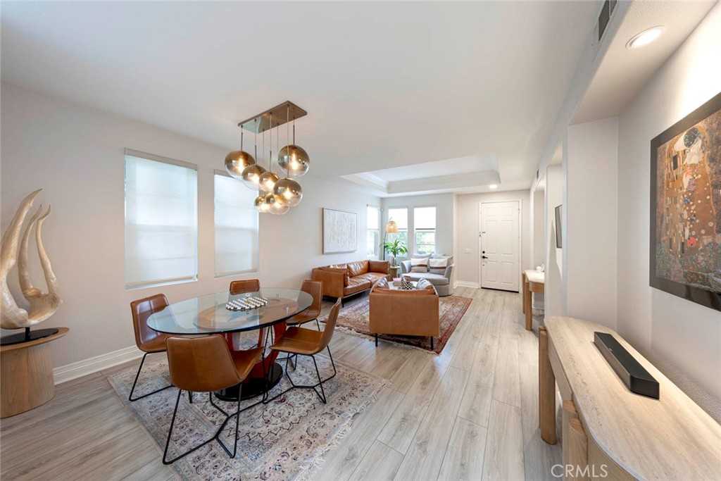 6 Teardrop Irvine, CA 92603 - Photo 5 of 42 a living room with furniture and wooden floor
