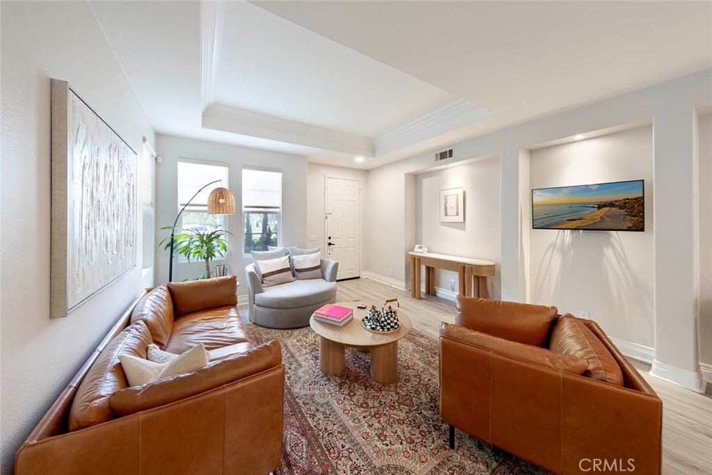 6 Teardrop Irvine, CA 92603 - Photo 8 of 42 a living room with furniture and a table