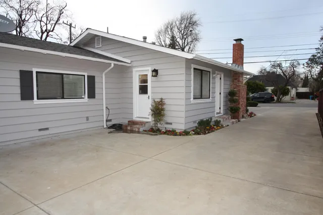 a view of a house with a patio