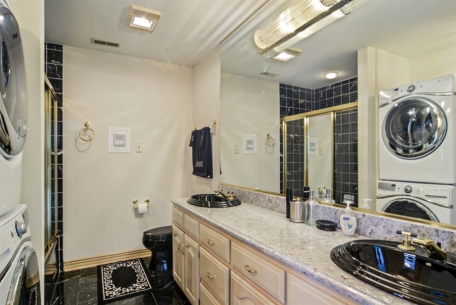314 West Rand Road Mount Prospect, IL 60056 - Photo 13 of 27 a kitchen with a sink appliances and cabinets