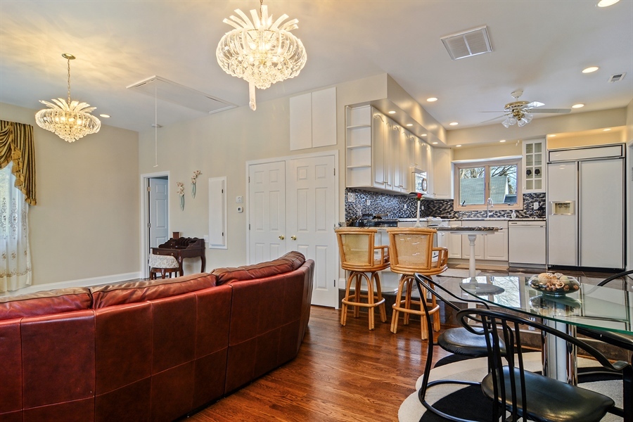 314 West Rand Road Mount Prospect, IL 60056 - Photo 20 of 27 a kitchen with a dining table chairs stainless steel appliances and cabinets