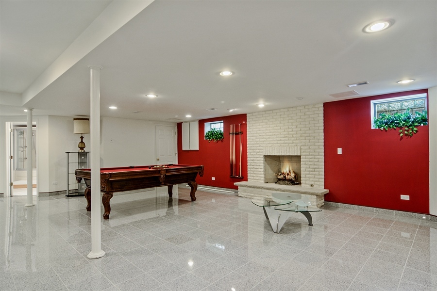 314 West Rand Road Mount Prospect, IL 60056 - Photo 21 of 27 a view of a livingroom with furniture and a fireplace