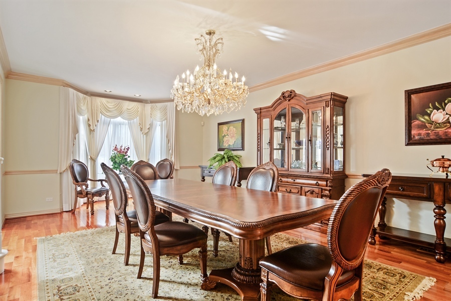 314 West Rand Road Mount Prospect, IL 60056 - Photo 8 of 27 a view of a dining room with furniture window and wooden floor