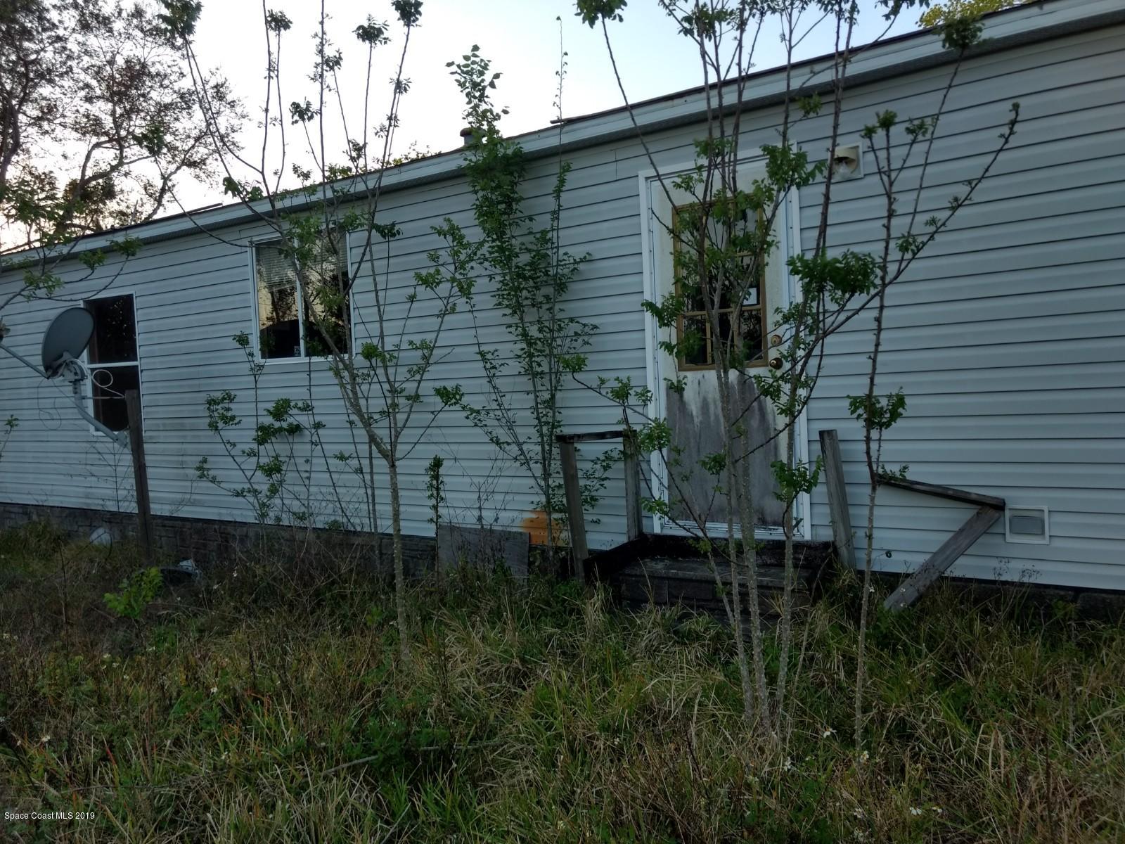4211 Aurantia Road Mims, FL 32754 - Photo 2 of 19 Rear