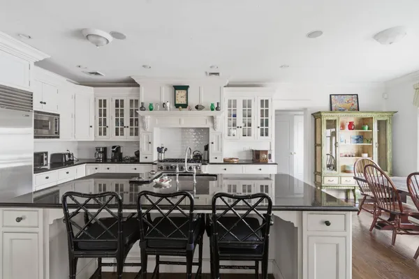 a view of a dining room kitchen and a window