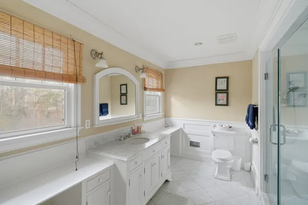 a view of bathroom with dual sinks