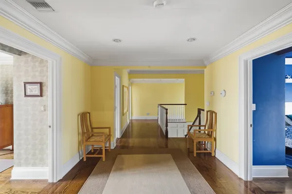a view of a livingroom with furniture and front door