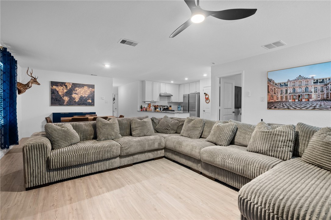 1118 Demeter Drive Portland, TX 78374 - Photo 17 of 28 a living room with furniture and a ceiling fan