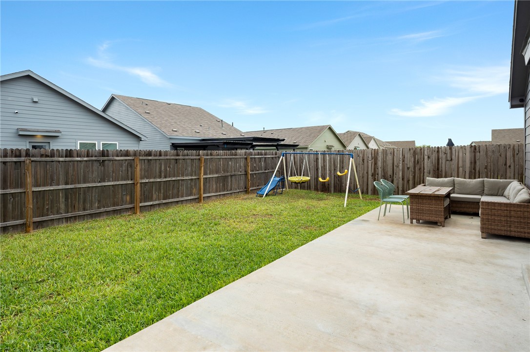 1118 Demeter Drive Portland, TX 78374 - Photo 25 of 28 a view of a backyard with furniture and a garden