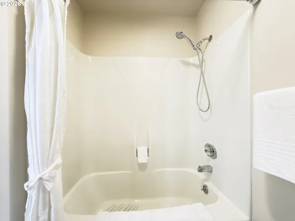 a bathroom with a bathtub