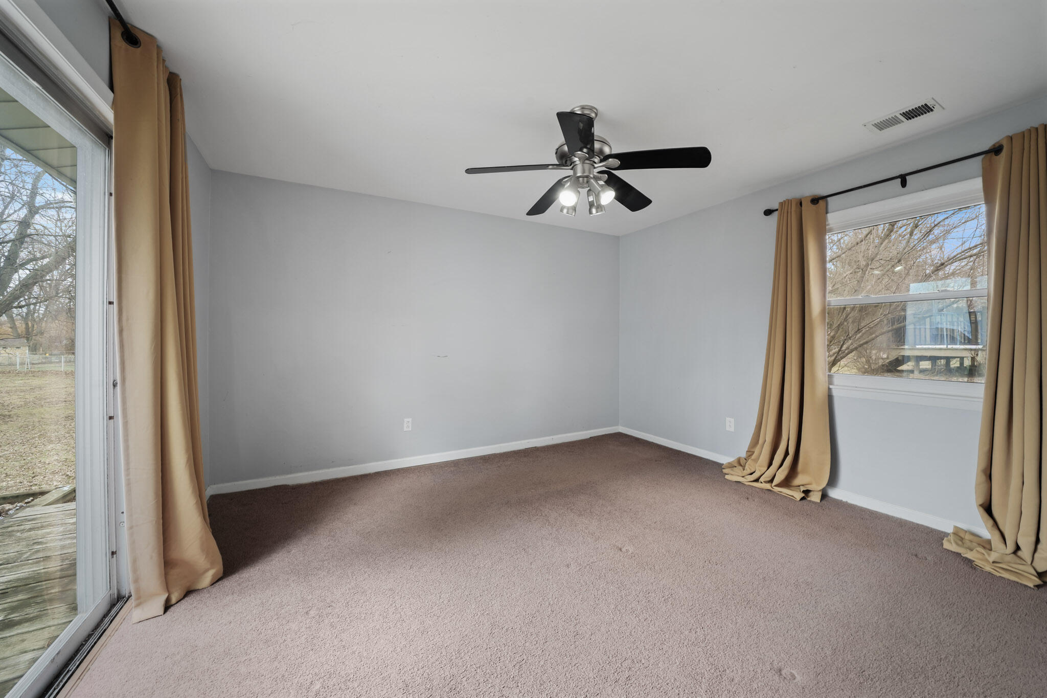 3339 Windy Hill Road Crown Point, IN 46307 - Photo 13 of 25 a view of room with a ceiling fan
