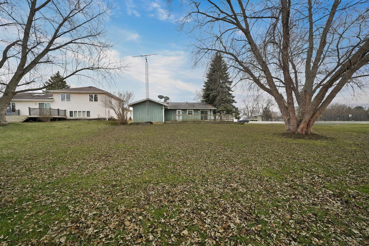 3339 Windy Hill Road Crown Point, IN 46307 - Photo 22 of 25 a view of a house with a yard