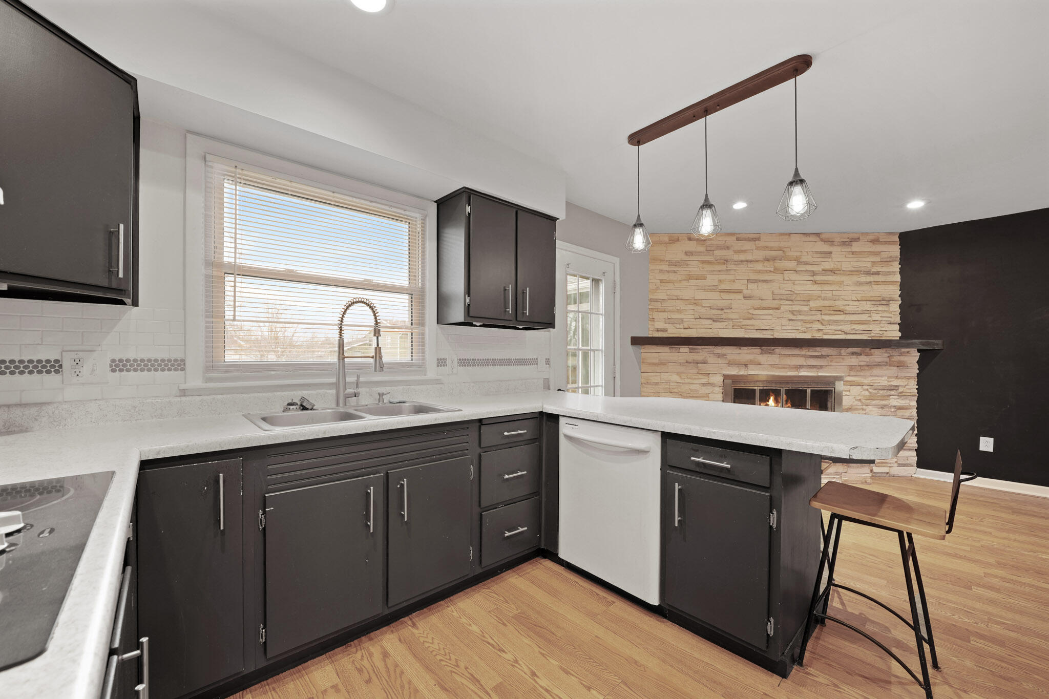 3339 Windy Hill Road Crown Point, IN 46307 - Photo 3 of 25 a kitchen with a sink cabinets and window
