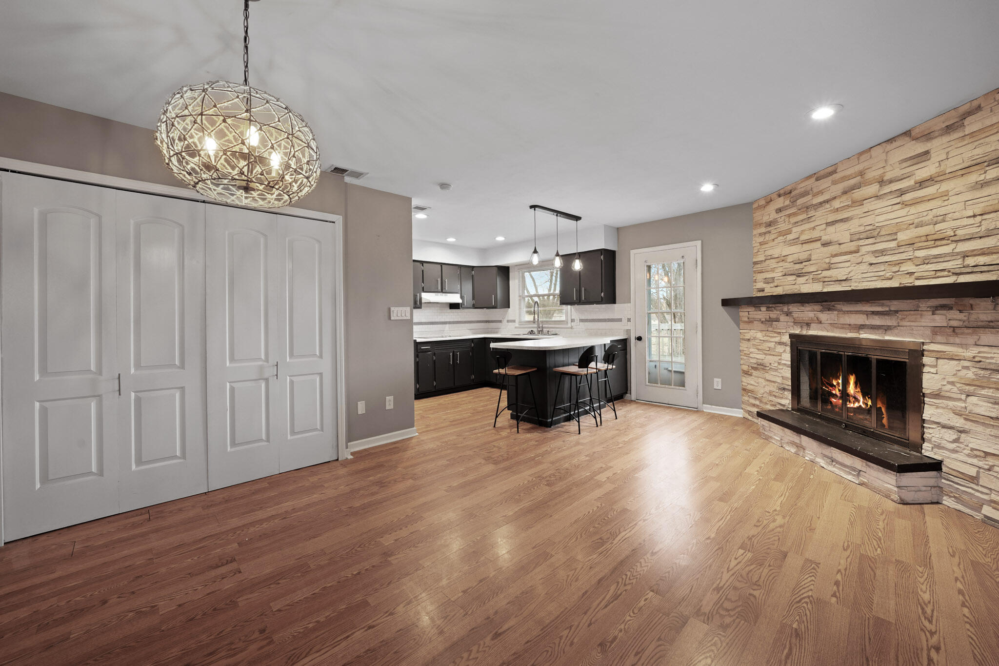 3339 Windy Hill Road Crown Point, IN 46307 - Photo 7 of 25 a living room with furniture and a fireplace