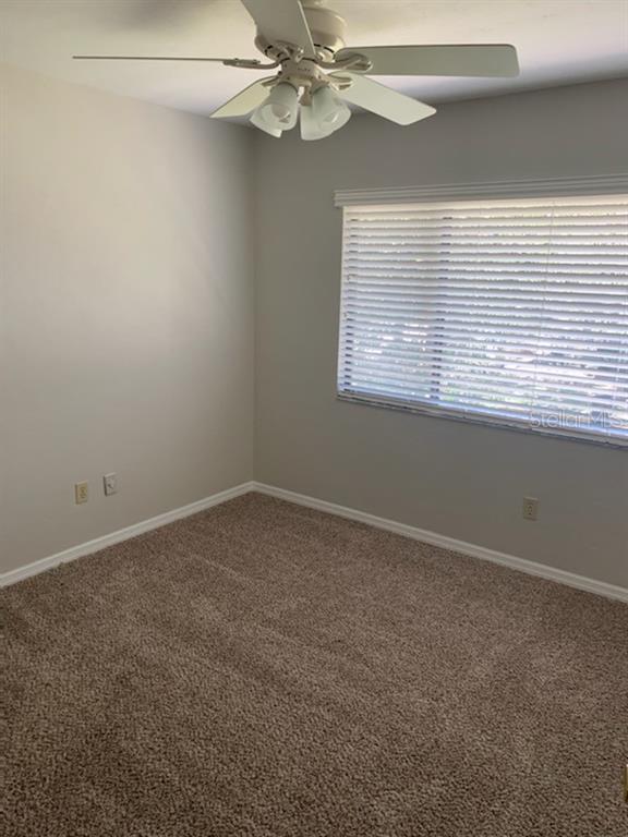 6206 Southwest 8th Lane Gainesville, FL 32607 - Photo 9 of 15 a view of an empty room with a window