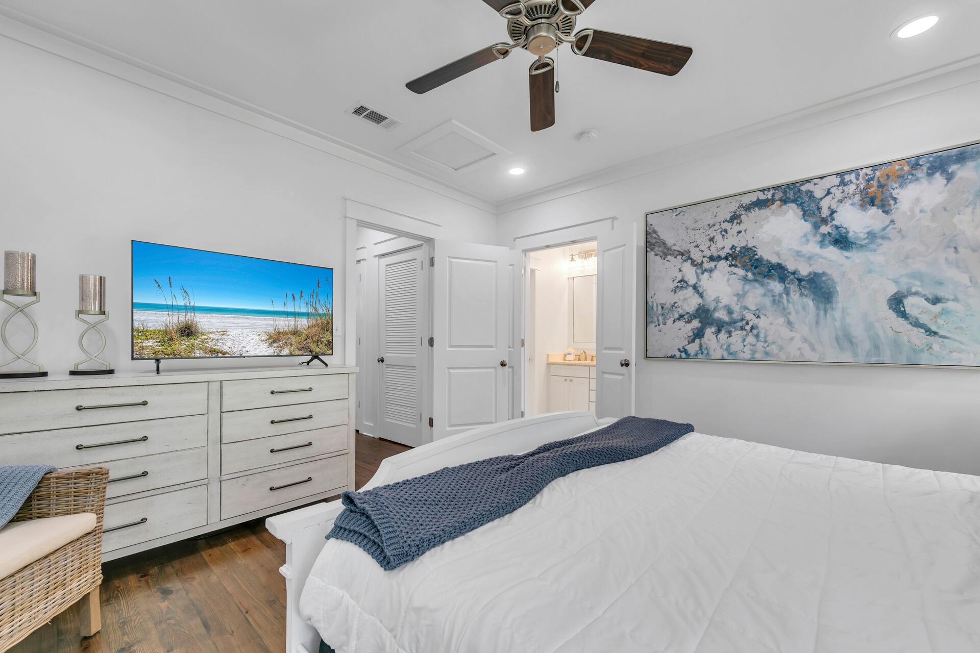 34 Okeechobee West Santa Rosa Beach, FL 32459 - Photo 20 of 91 a bedroom with a bed and a chandelier
