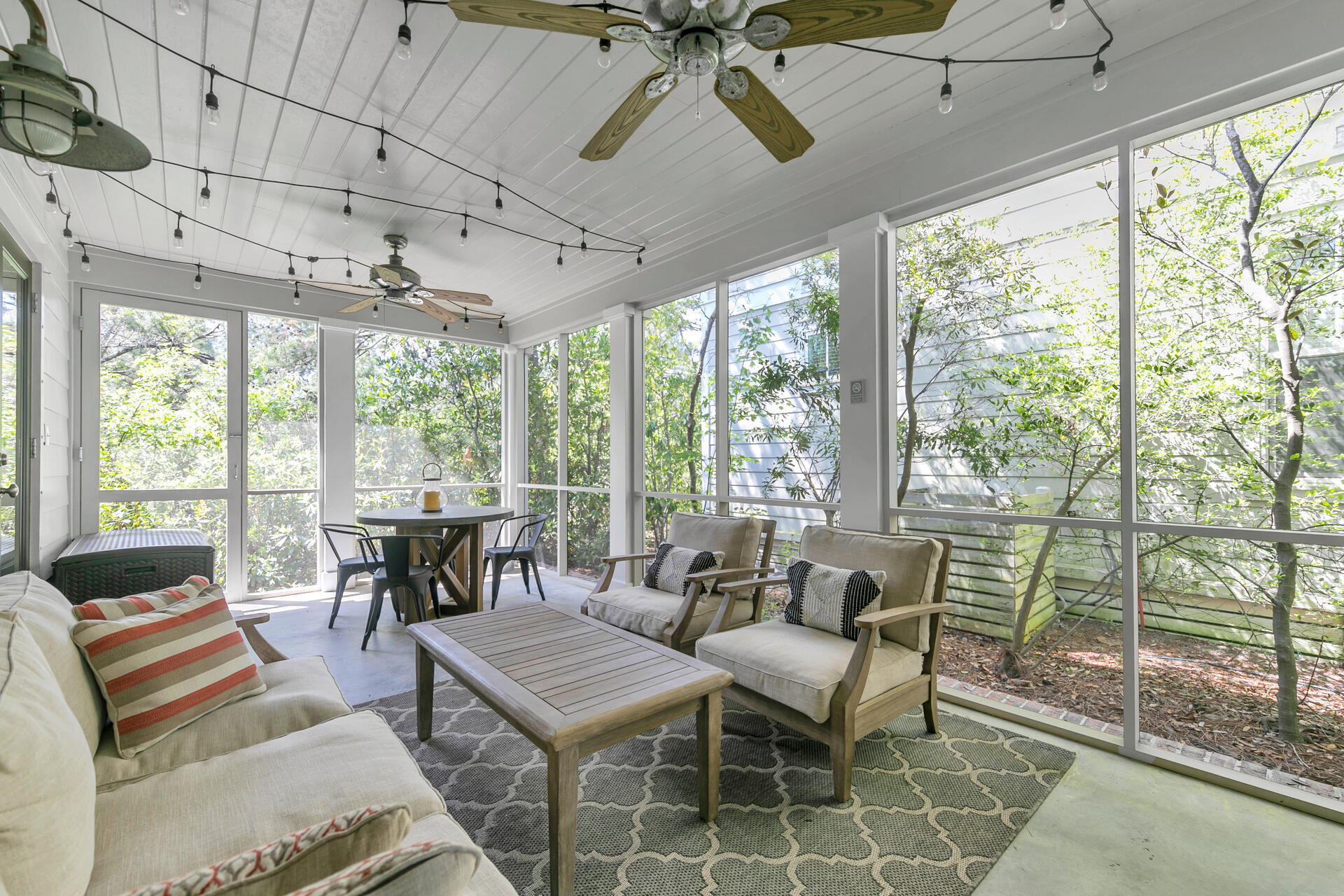 34 Okeechobee West Santa Rosa Beach, FL 32459 - Photo 23 of 91 a living room with furniture and a floor to ceiling window