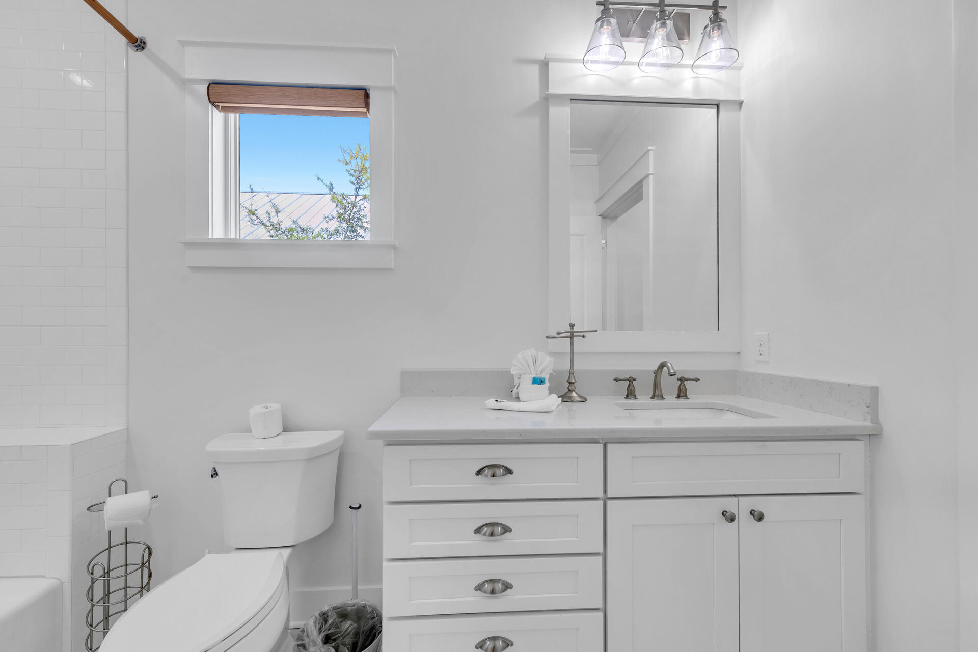 34 Okeechobee West Santa Rosa Beach, FL 32459 - Photo 35 of 91 a bathroom with a toilet sink and mirror