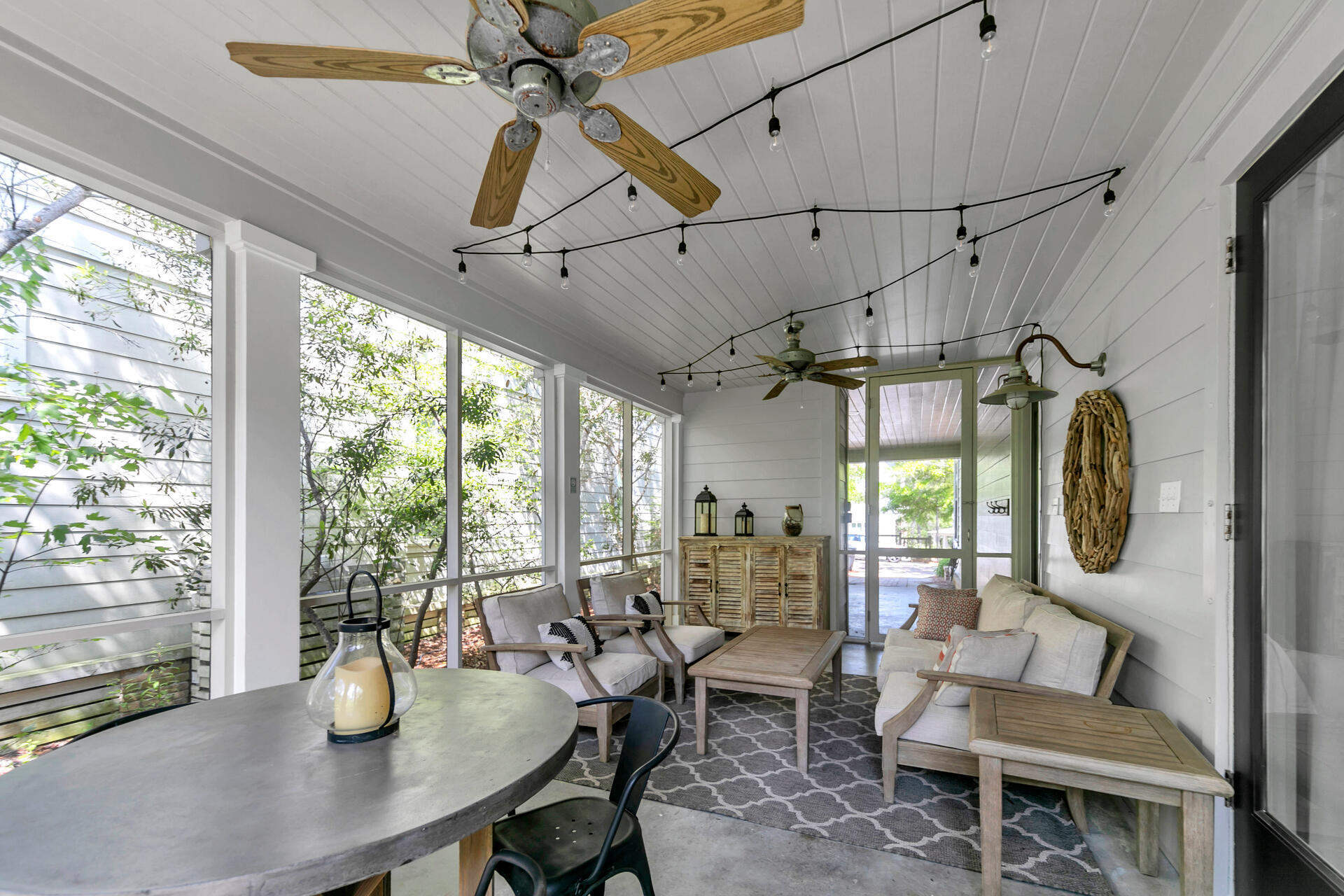 34 Okeechobee West Santa Rosa Beach, FL 32459 - Photo 39 of 91 a dining room with furniture a chandelier and wooden floor
