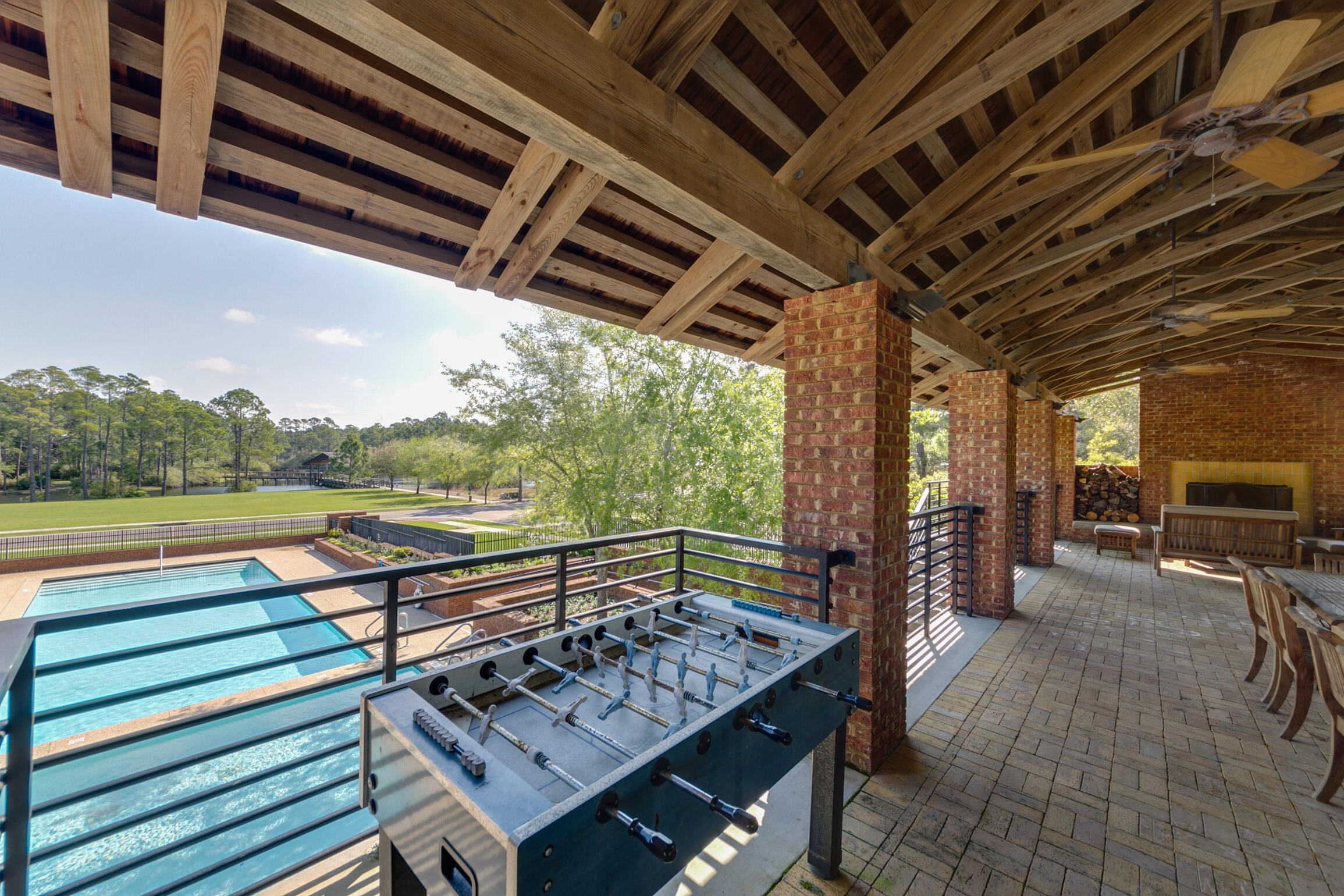 34 Okeechobee West Santa Rosa Beach, FL 32459 - Photo 52 of 91 a view of a roof deck with couches and wooden floor