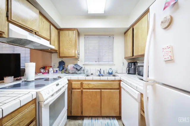 a view of storage and utility room with washer and dryer