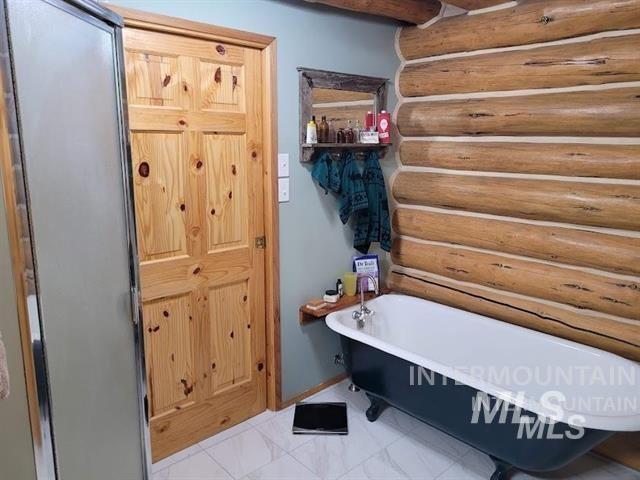 112 Three Forks Road Kamiah, ID 83536 - Photo 20 of 45 Mudroom featuring rustic walls