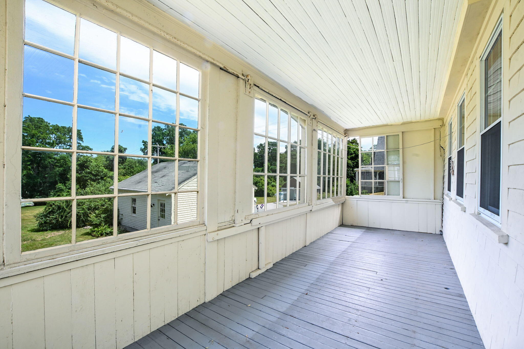 1067 Sandwich Road Sagamore, MA 02561 - Photo 16 of 35 Enclosed Porch