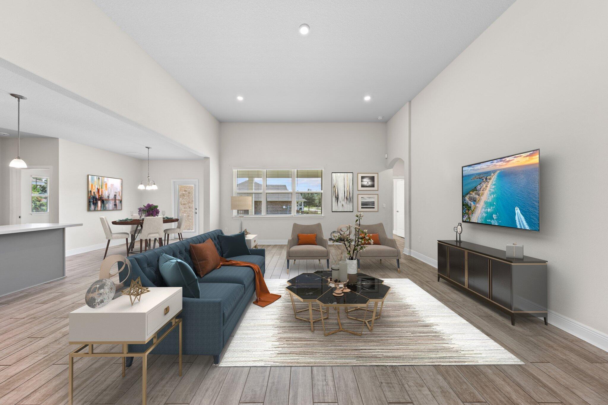 91 Sweet Tea Lane Freeport, FL 32439 - Photo 13 of 80 a living room with furniture a flat screen tv and a fireplace