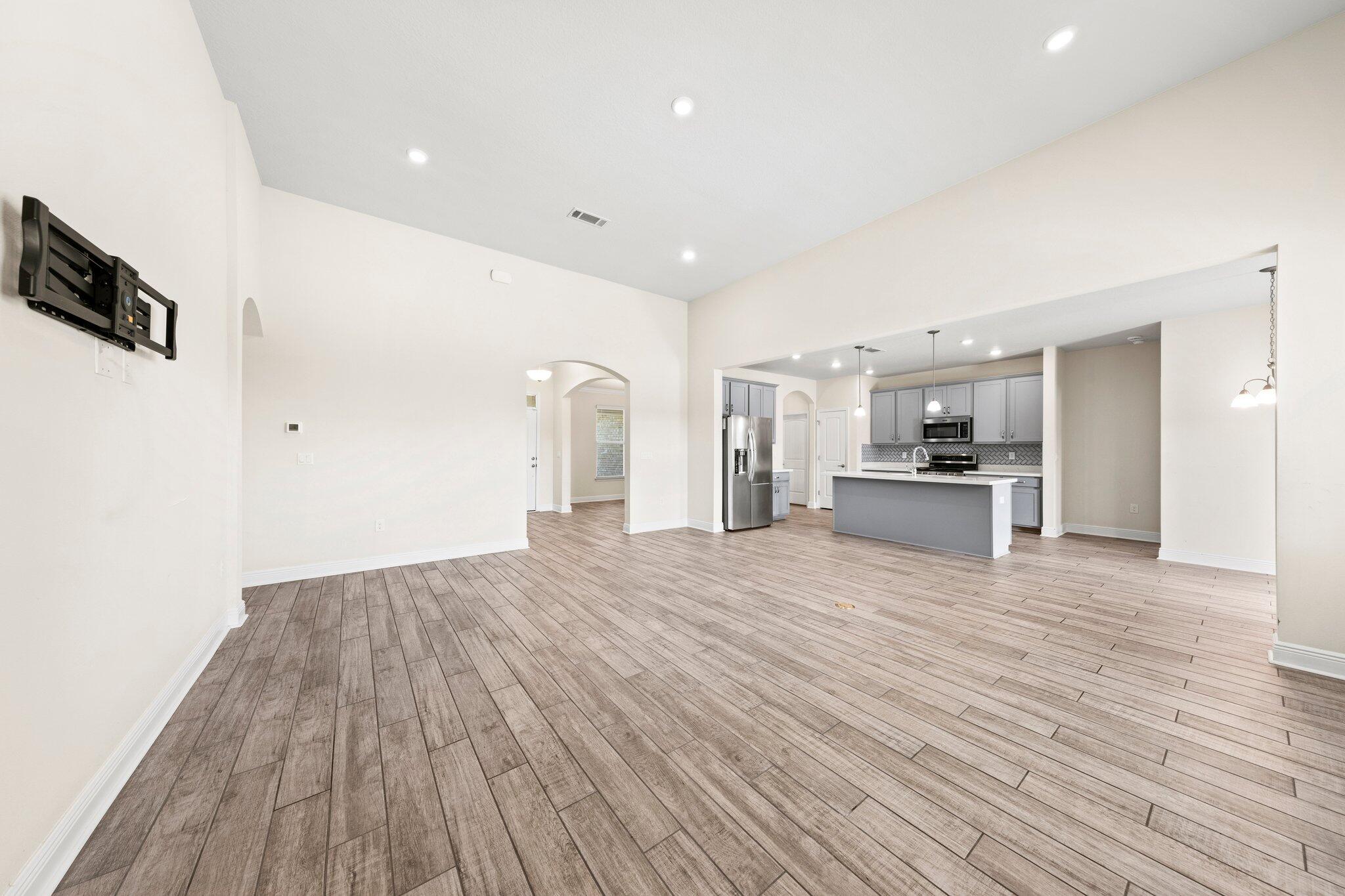 91 Sweet Tea Lane Freeport, FL 32439 - Photo 27 of 80 a view of empty room with wooden floor